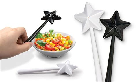 Get ready to perform culinary magic with the Magic Wand Salt and Pepper Shaker Set by Fred.